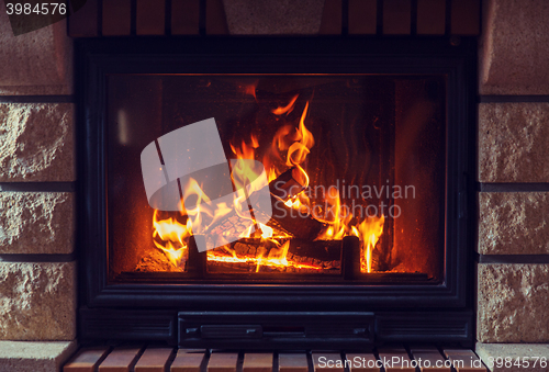 Image of close up of burning fireplace at home