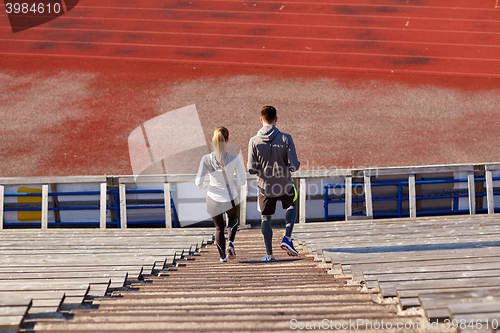 Image of couple walking downstairs on stadium