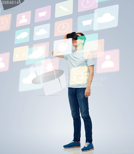 Image of happy man in virtual reality headset or 3d glasses