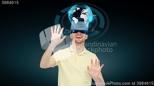 Image of happy man in virtual reality headset or 3d glasses