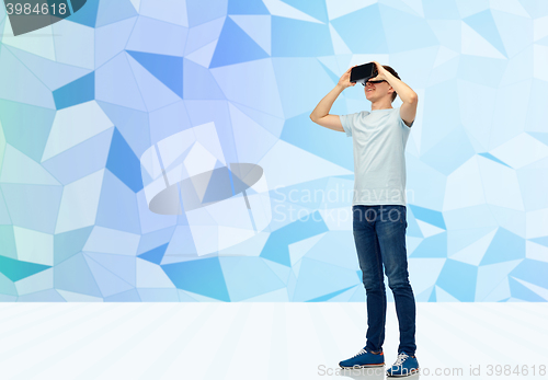 Image of happy man in virtual reality headset or 3d glasses