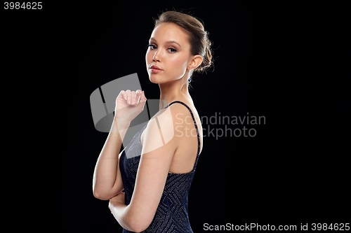 Image of beautiful young asian woman with diamond earring