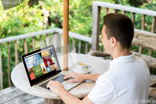 Image of close up of businessman with laptop on terrace