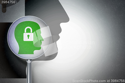 Image of Information concept:  Head With Padlock with optical glass on digital background