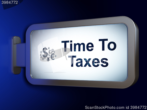 Image of Finance concept: Time To Taxes and Finance Symbol on billboard background