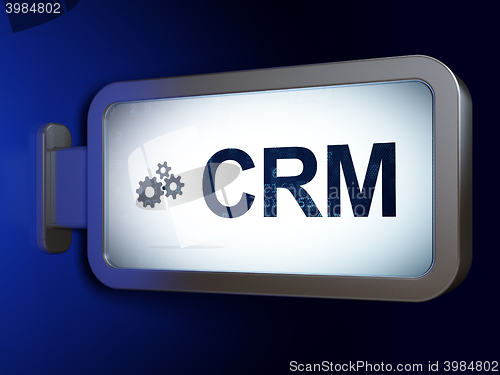 Image of Business concept: CRM and Gears on billboard background