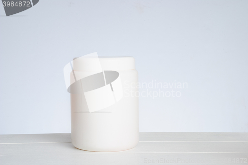 Image of White cosmetic bottle