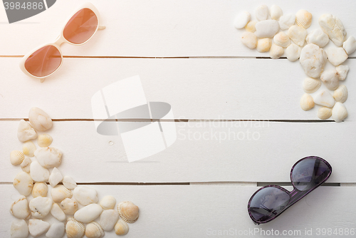 Image of beach accessories on wooden board