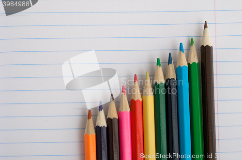 Image of Colored pencils and paper