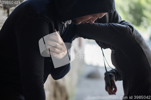 Image of close up of addicts on street