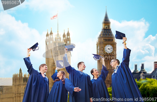 Image of group of smiling students with mortarboards