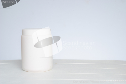 Image of White cosmetic bottle