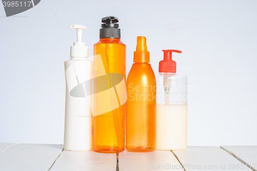 Image of Group of cosmetic bottles isolated on white