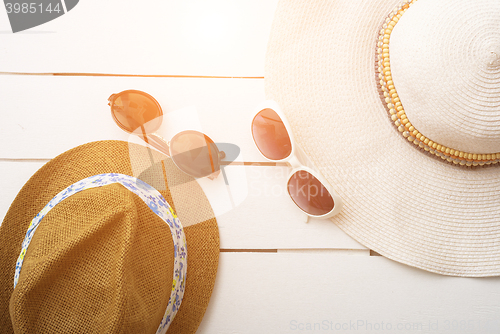 Image of beach accessories on wooden board