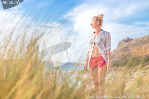 Image of Free Happy Woman Enjoying Sun on Vacations.