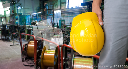 Image of Worker with safety helmet