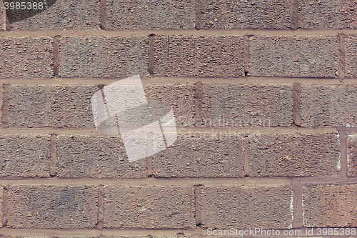 Image of brown brick wall backdrop