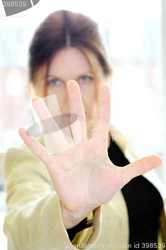 Image of Mature woman gesturing stop