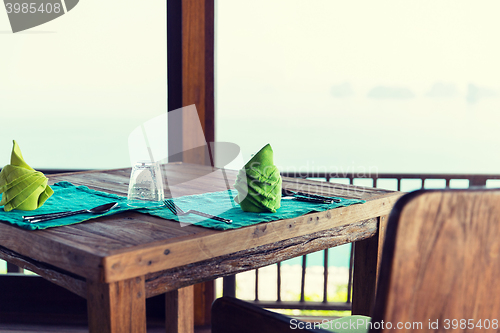 Image of close up of table setting at restaurant in asia