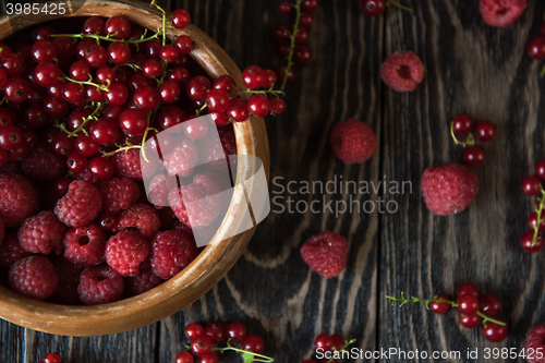 Image of Fresh berries on wooden table