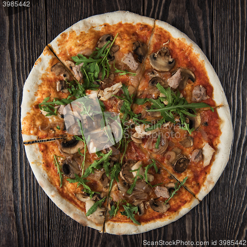 Image of Pizza with chicken and mushrooms