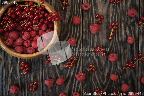 Image of Fresh berries on wooden table