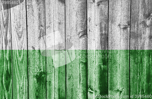 Image of Flag on weathered wood