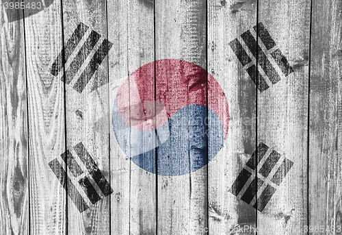 Image of Flag on weathered wood