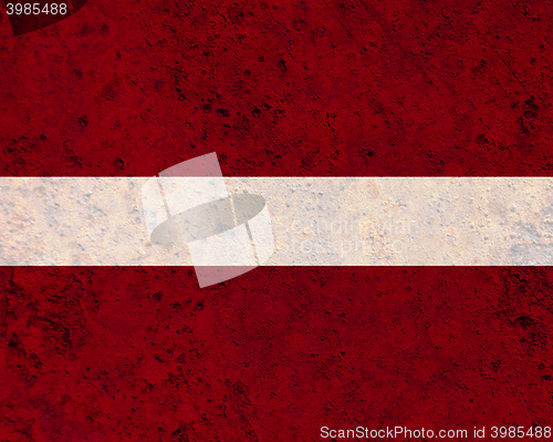 Image of Flag on rusty metal
