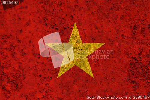 Image of Flag on rusty metal