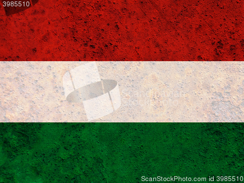 Image of Flag on rusty metal