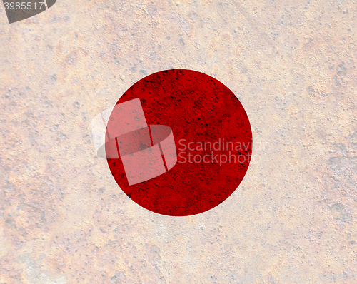 Image of Flag on rusty metal