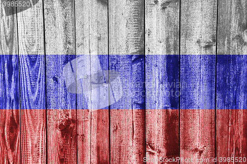 Image of Flag on weathered wood