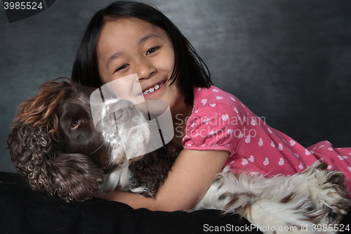 Image of Child and dog