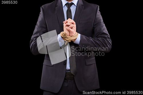 Image of Businessmen tied hand
