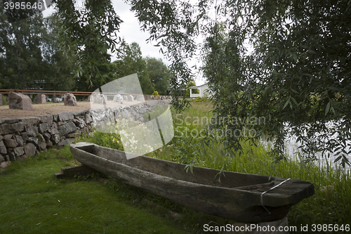 Image of old boat and bridge