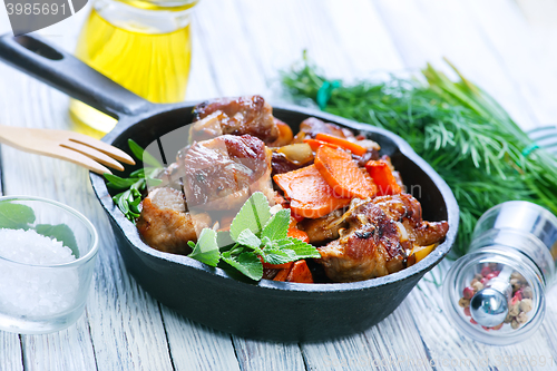 Image of fried meat with vegetables