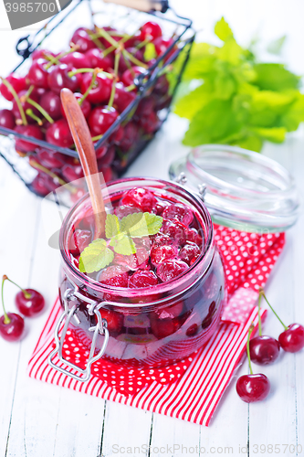 Image of cherry jam and berries