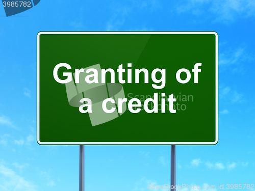 Image of Money concept: Granting of A credit on road sign background