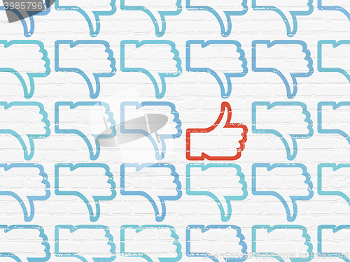 Image of Social media concept: thumb up icon on wall background