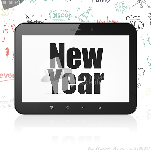 Image of Entertainment, concept: Tablet Computer with New Year on display