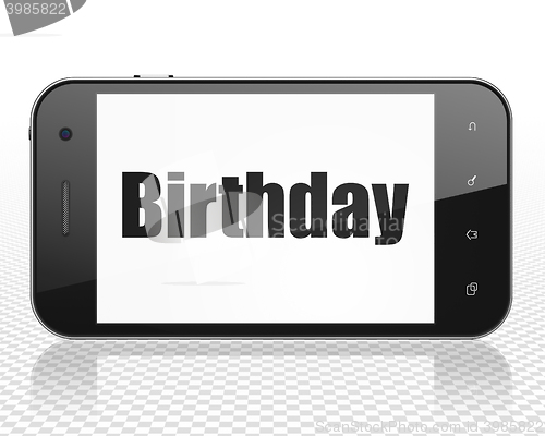 Image of Holiday concept: Smartphone with Birthday on display