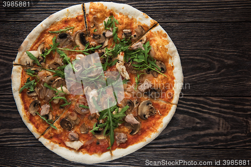 Image of Pizza with chicken and mushrooms