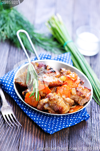 Image of fried meat with vegetables