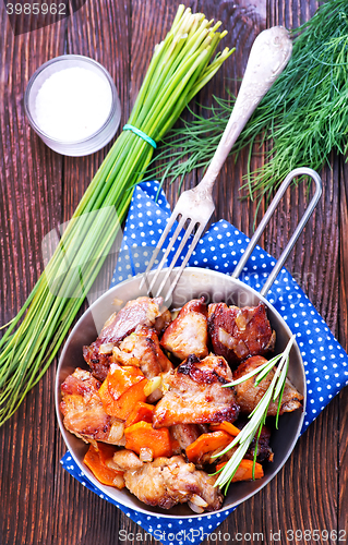Image of fried meat with vegetables