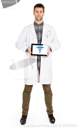Image of Doctor holding tablet - Caduceus symbol
