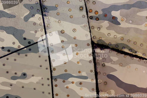 Image of Piece of aircraft grunge metal background, army camo