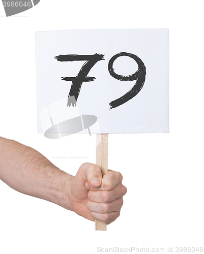 Image of Sign with a number, 79