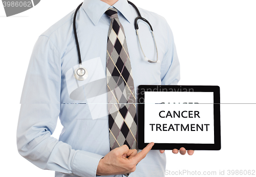 Image of Doctor holding tablet - Cancer