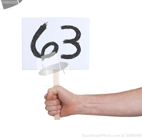 Image of Sign with a number, 63